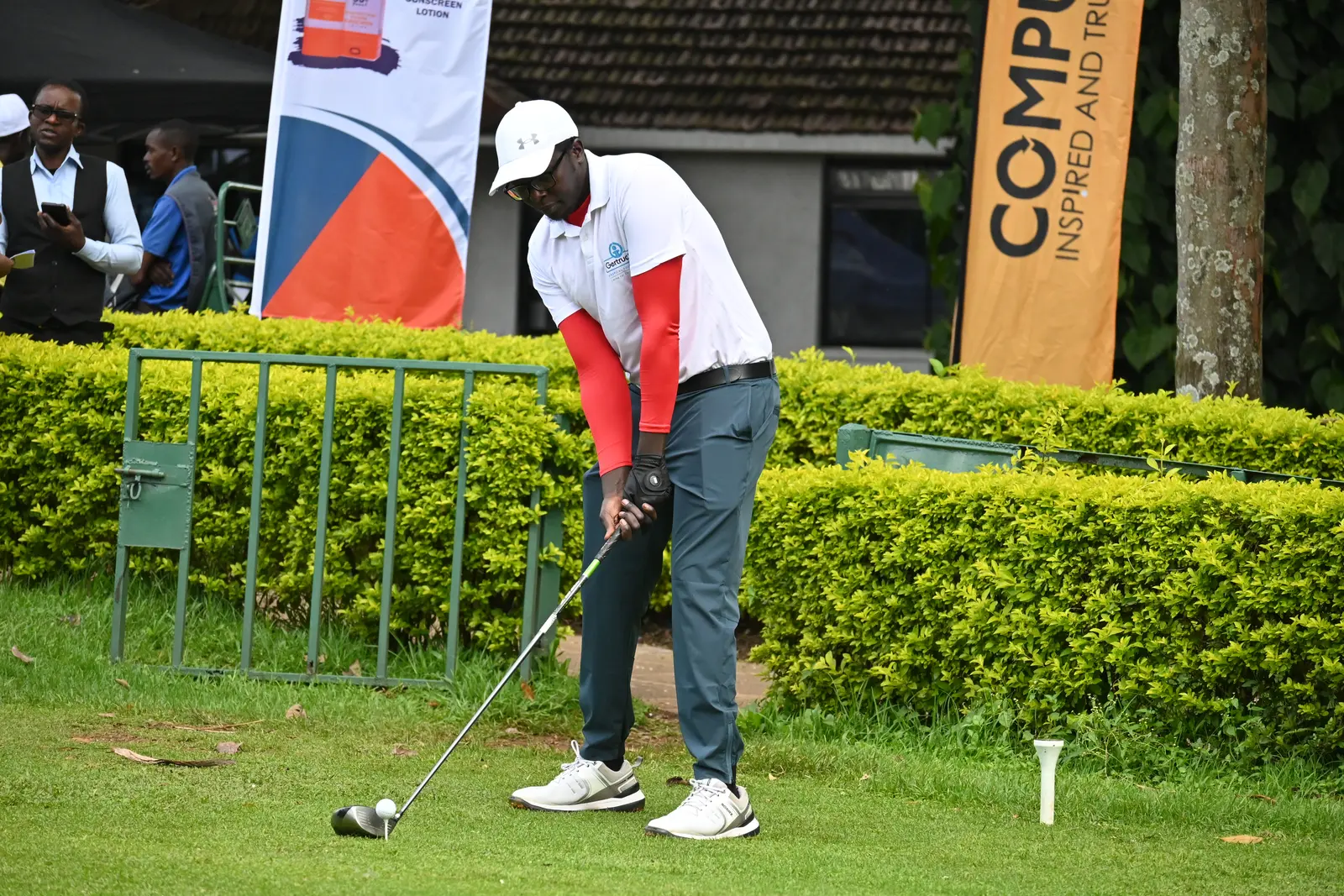Golfer preparing to tee off at the Foundation Charity Golf Tournament